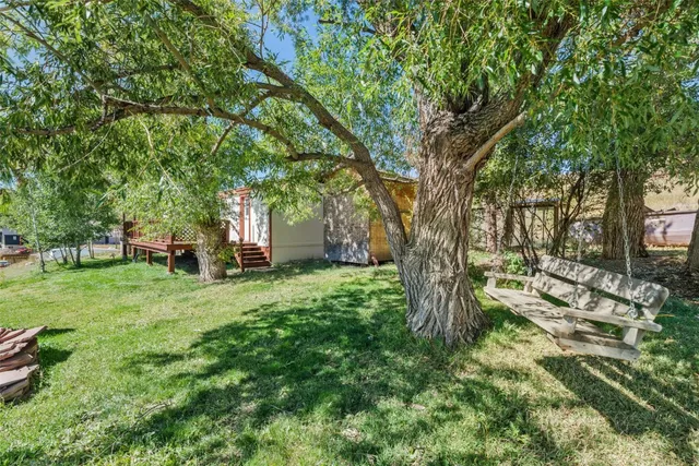 a view of backyard with outdoor space