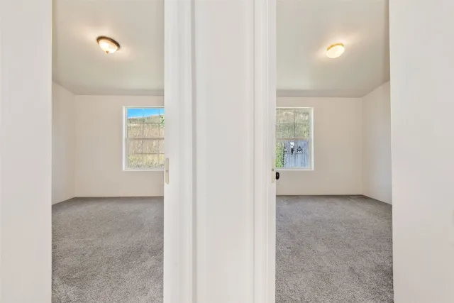 an empty room with windows