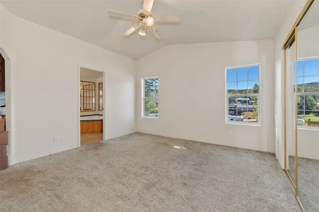 an empty room with windows