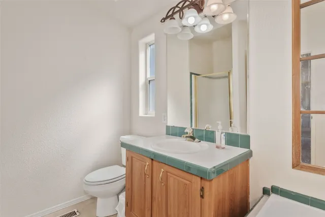 a white bath tub sitting next to a window
