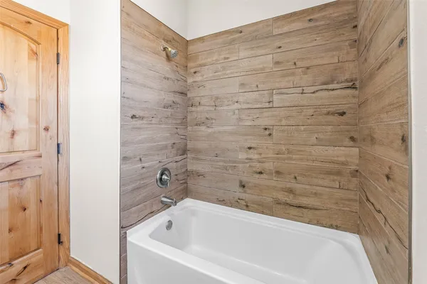 a bathroom with a bathtub