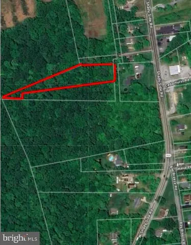 a view of field with grass and playing ground