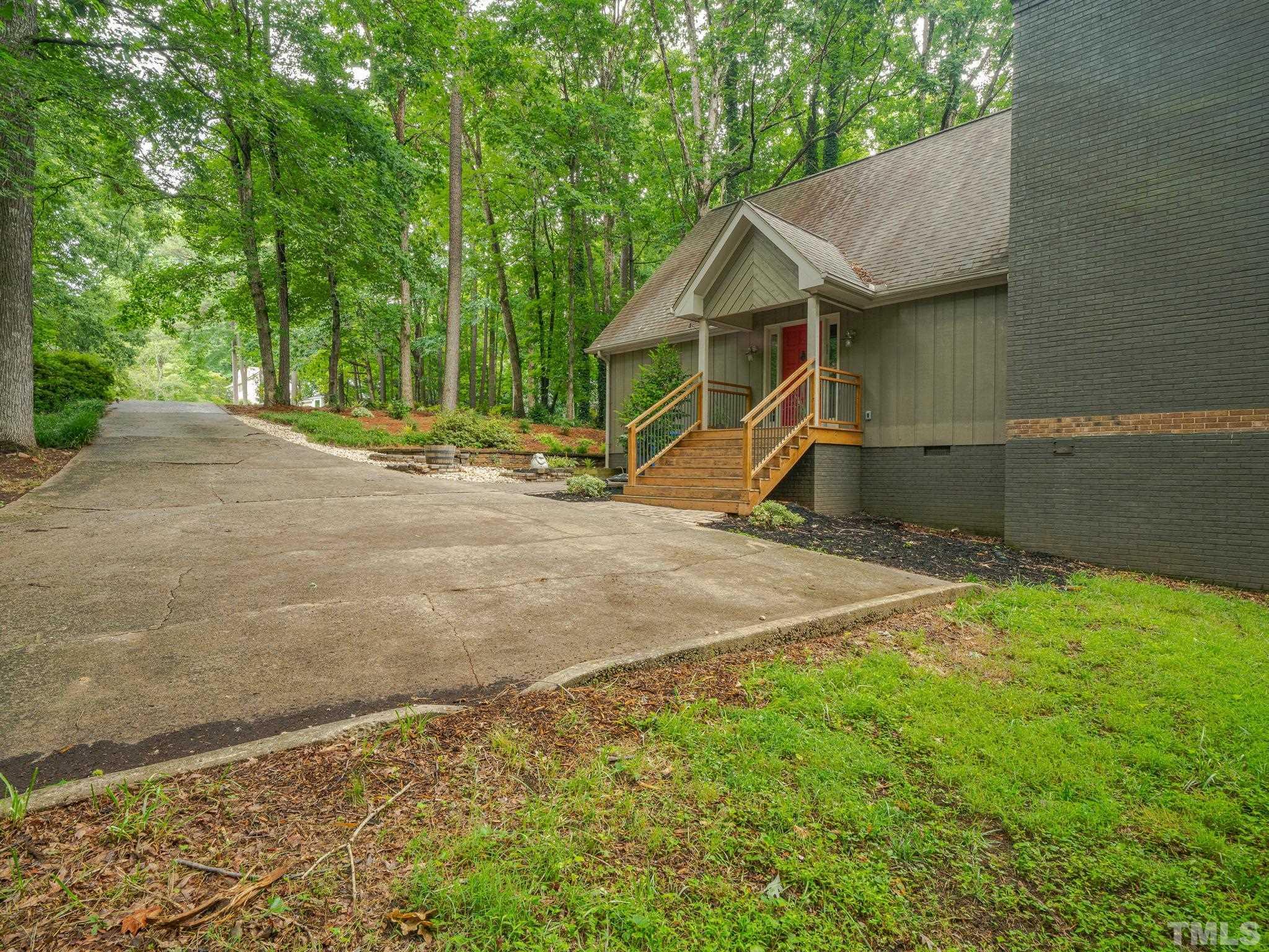 3116 Paxton Place Raleigh, NC 27613 - Photo 61 of 67 a view of an house with backyard space and balcony