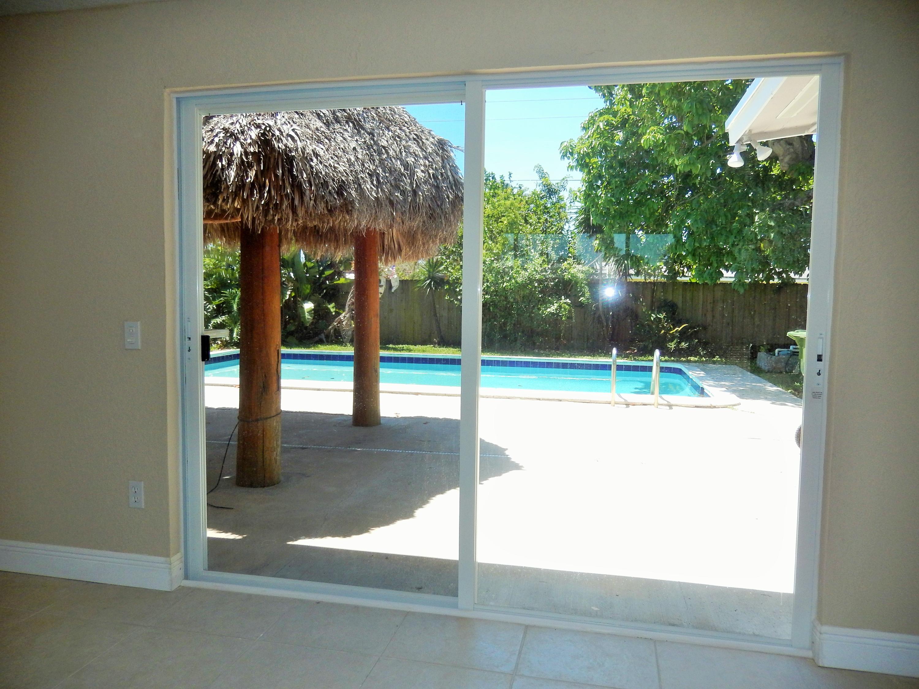 313 Pinehurst Road Palm Springs, FL 33461 - Photo 23 of 24 inside pool view