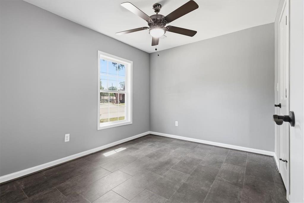 409 Calhoun Avenue Northeast Rome, GA 30161 - Photo 20 of 25 a view of an empty room with a window