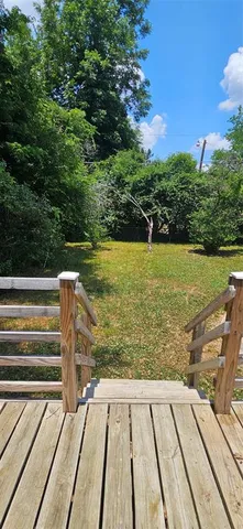 a view of a balcony with ocean view