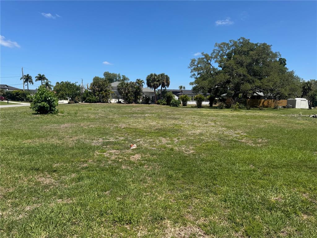 Dona Way Nokomis, FL 34275 - Photo 2 of 5 a view of a field with trees