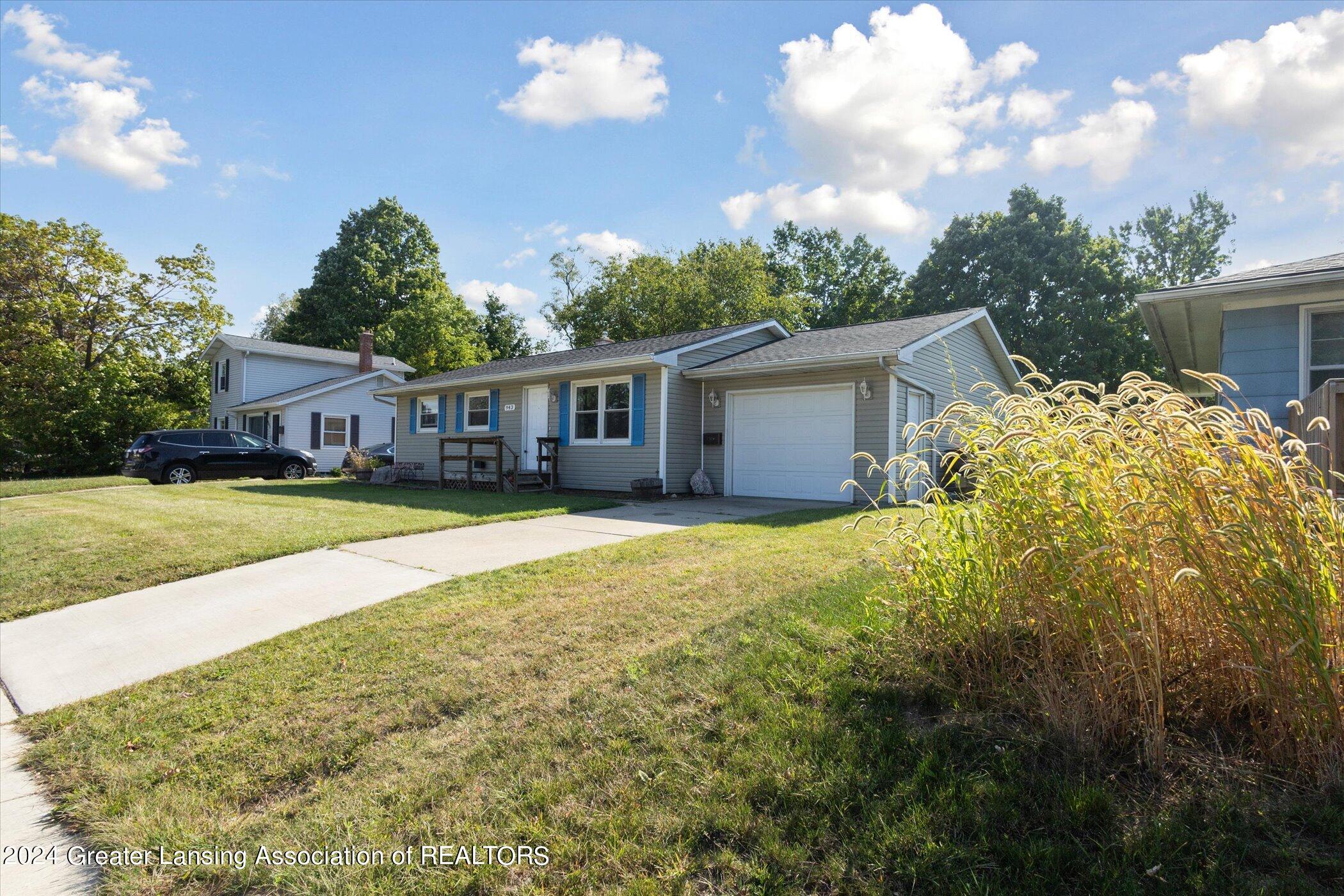943 Riverside Drive Portland, MI 48875 - Photo 2 of 31 02-943-Riverside-Dr-Portland-MI-48875-Wi