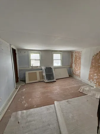 a view of livingroom with furniture and windows