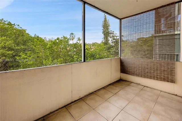 a view of a balcony with an outdoor space