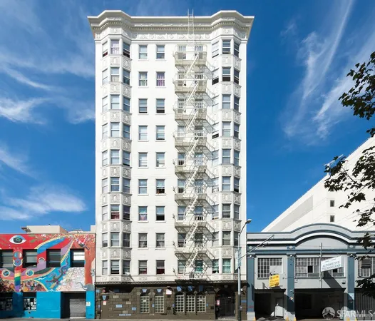 a view of building with door and outdoor space