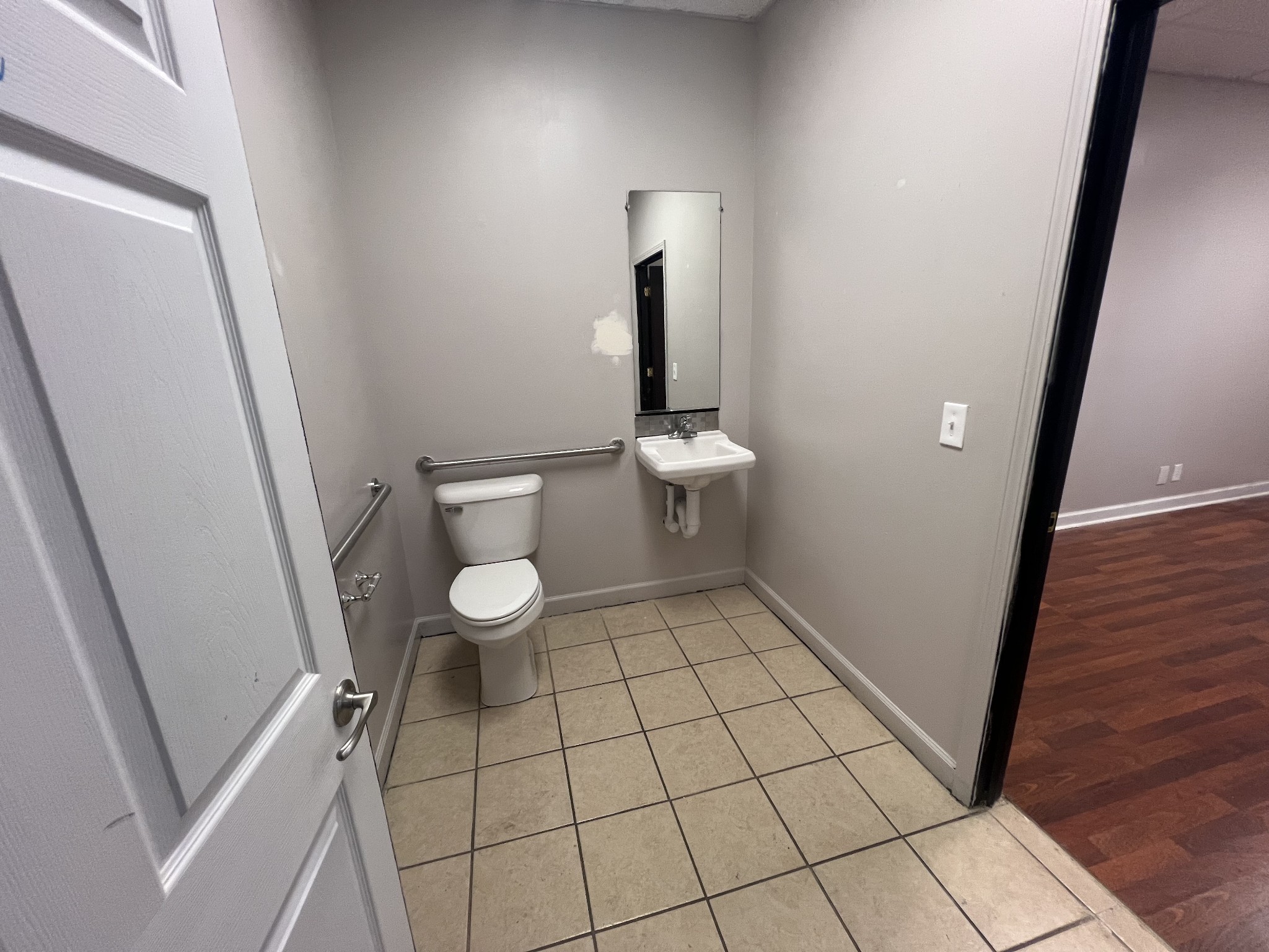 149 Kender Rhea Court Clarksville, TN 37043 - Photo 14 of 26 a view of an empty room with wooden floor and a window