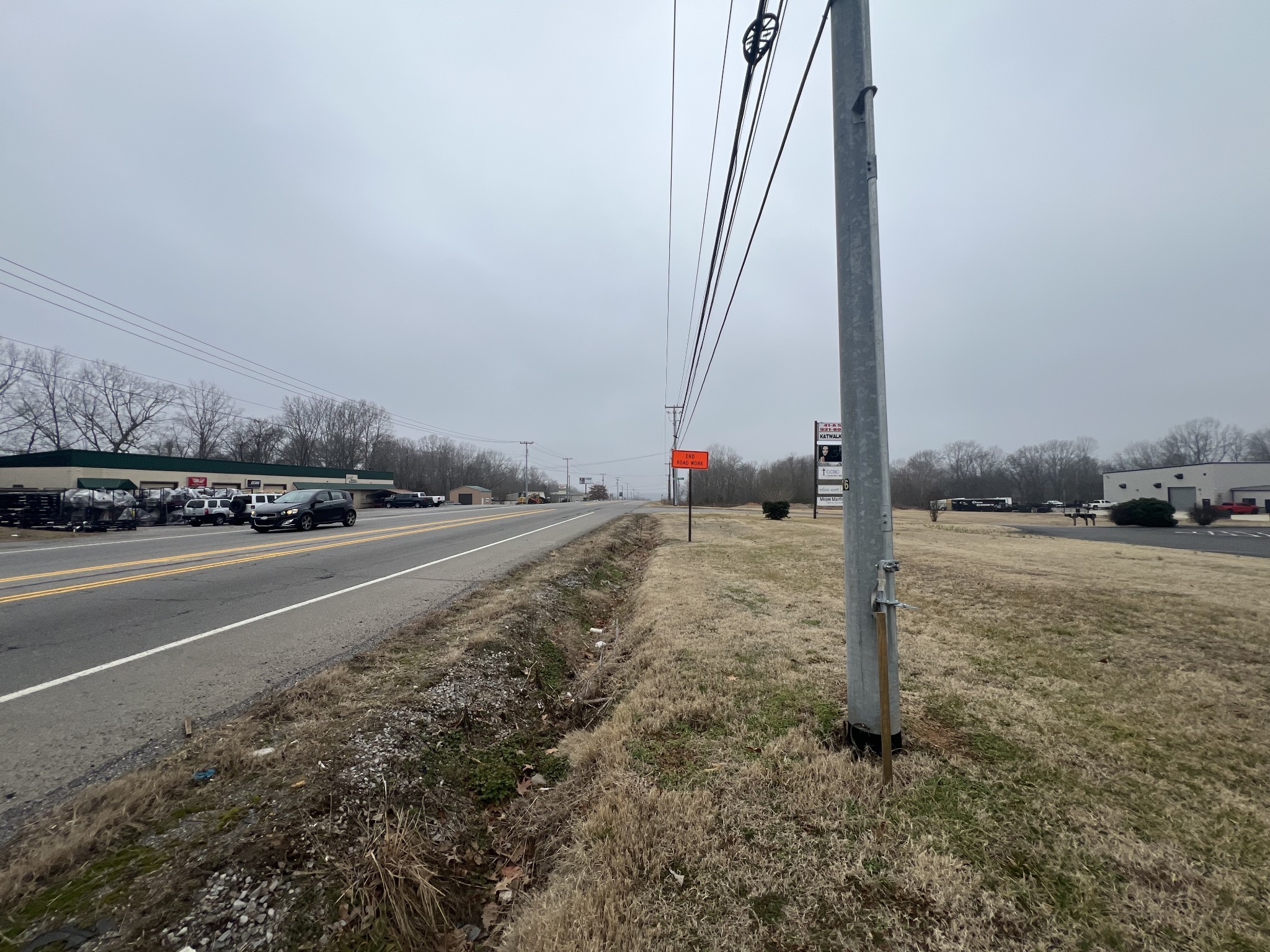 149 Kender Rhea Court Clarksville, TN 37043 - Photo 24 of 26 a view of a street with a cars parked on the road