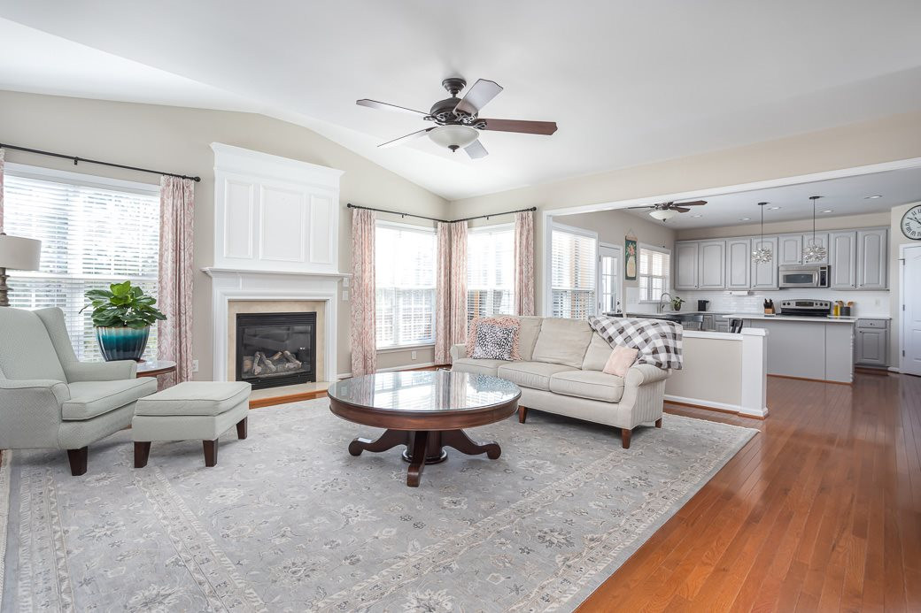 8206 Marvino Lane Raleigh, NC 27613 - Photo 2 of 30 Family room is bright and airy, with cozy gas fireplace, and gorgeous hardwoods. Family Room