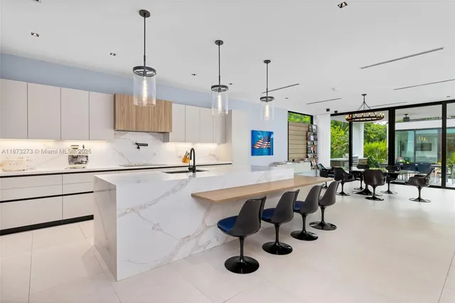 a view of walk in closet with clothes