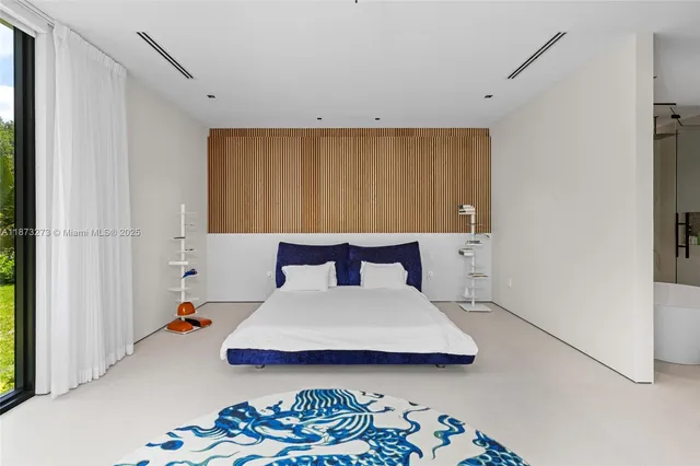 a view of a swimming pool with a lounge chairs