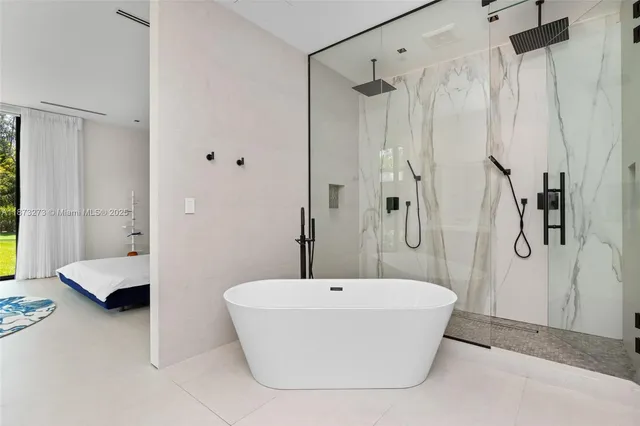 a room with furniture and a large window