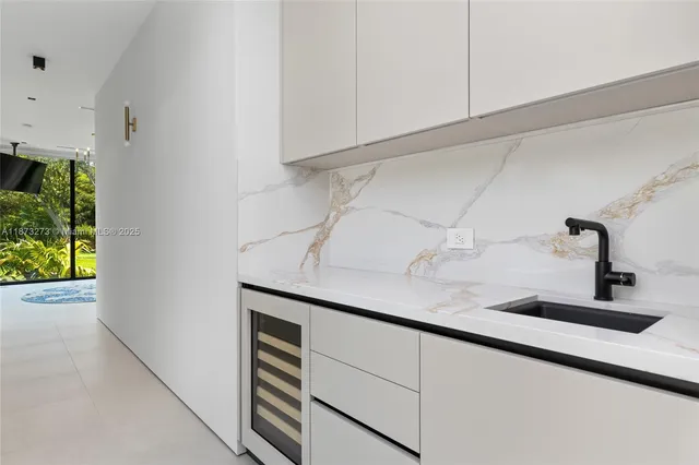 a room with furniture and a large window