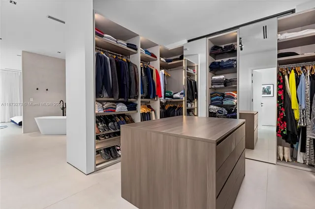 a front view of a house with a yard table and chairs
