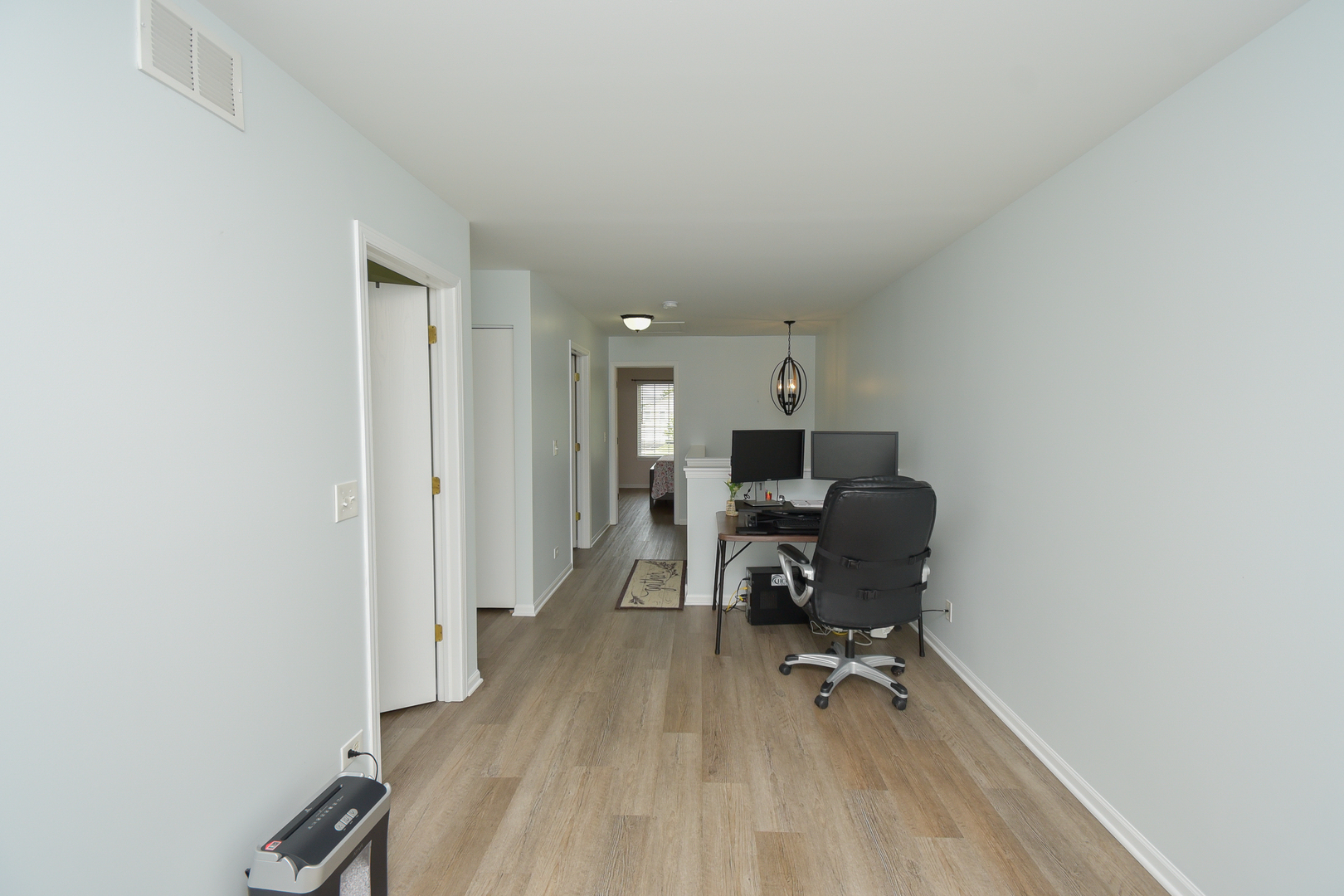 39672 Warren Lane Beach Park, IL 60083 - Photo 14 of 15 a view of a workspace with furniture and wooden floor