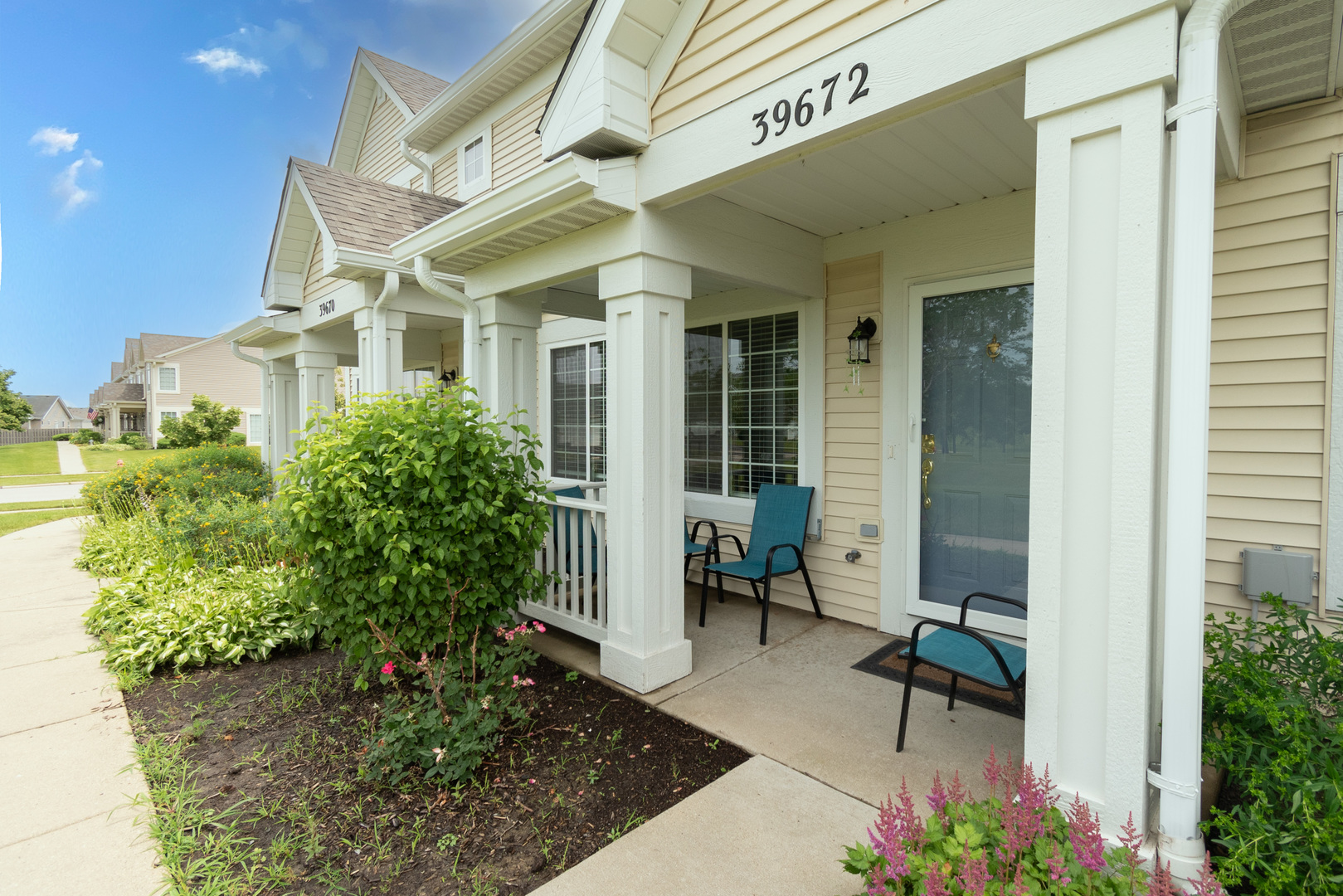39672 Warren Lane Beach Park, IL 60083 - Photo 2 of 15 a front view of a house with a garden