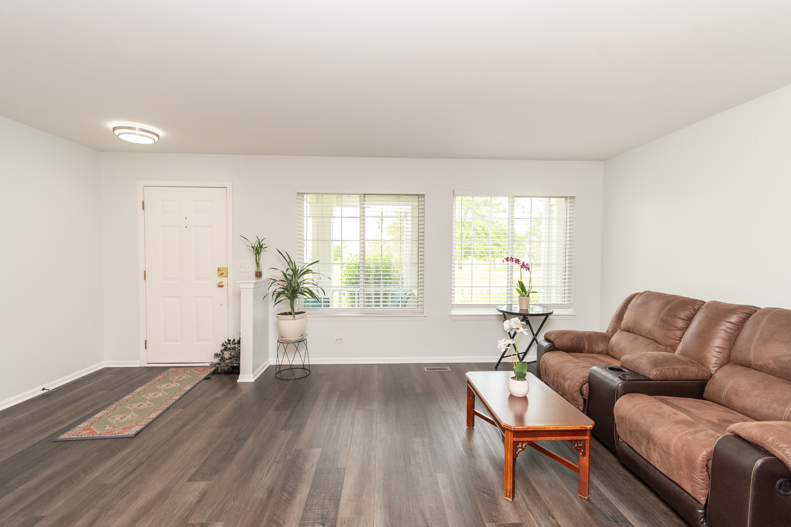 39672 Warren Lane Beach Park, IL 60083 - Photo 5 of 15 a living room with furniture and a large window