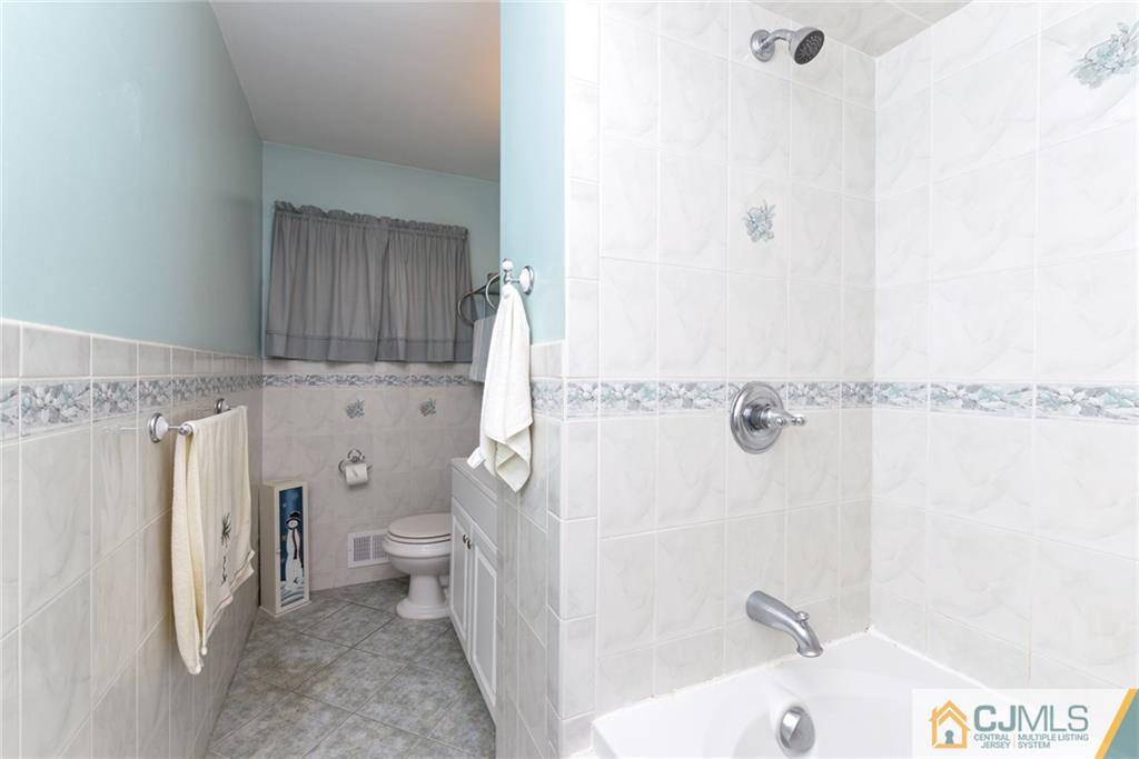 178 Princeton Road Old Bridge, NJ 08859 - Photo 8 of 16 a bathroom with a sink and a toilet