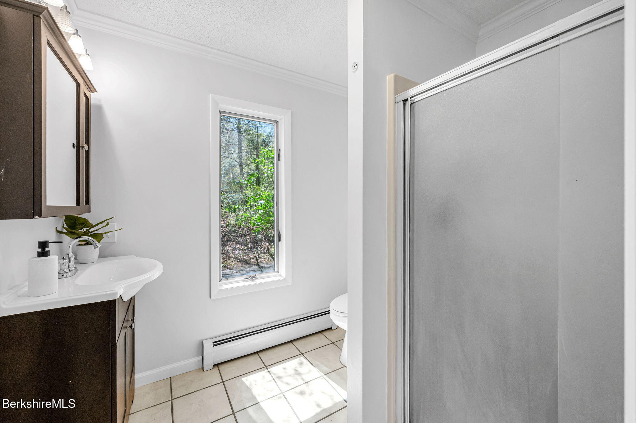 1874 Home Road Sheffield, MA 01230 - Photo 26 of 42 a bathroom with a sink mirror and a shower