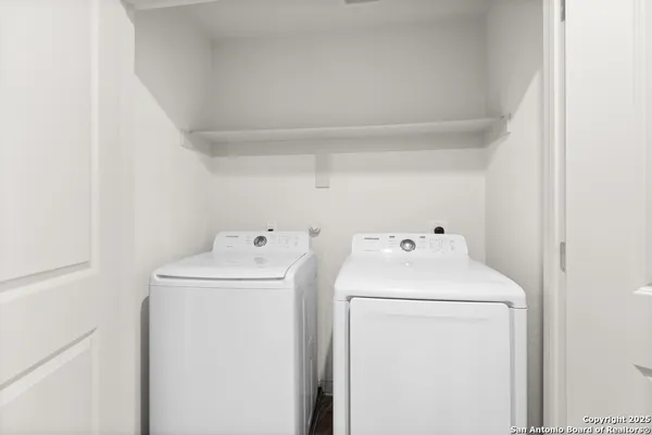 a utility room with dryer and washer