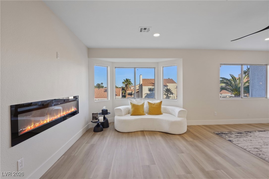 264 Via Contata Street Henderson, NV 89074 - Photo 14 of 26 Primary lounge & fireplace