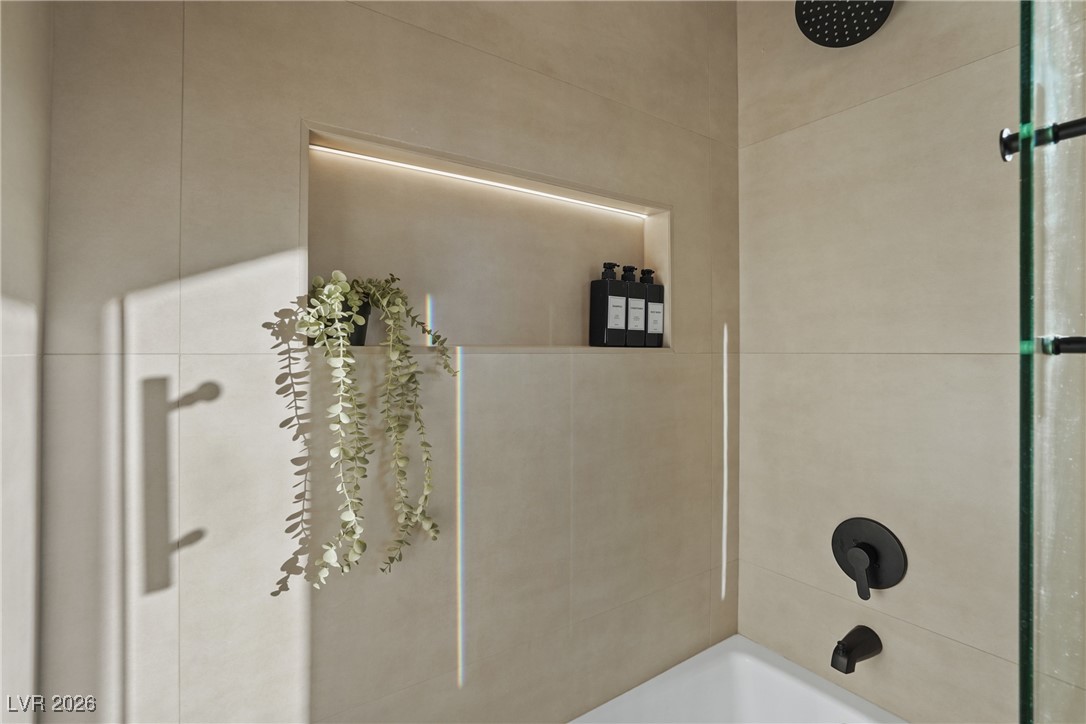 264 Via Contata Street Henderson, NV 89074 - Photo 21 of 26 LED undercount lights in all restrooms and Glass doors