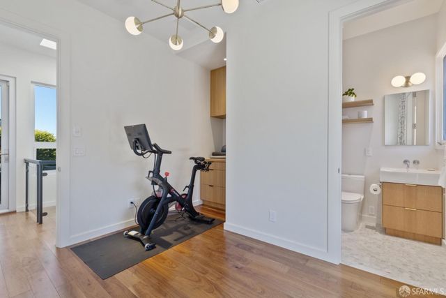 a bedroom with bed and a window