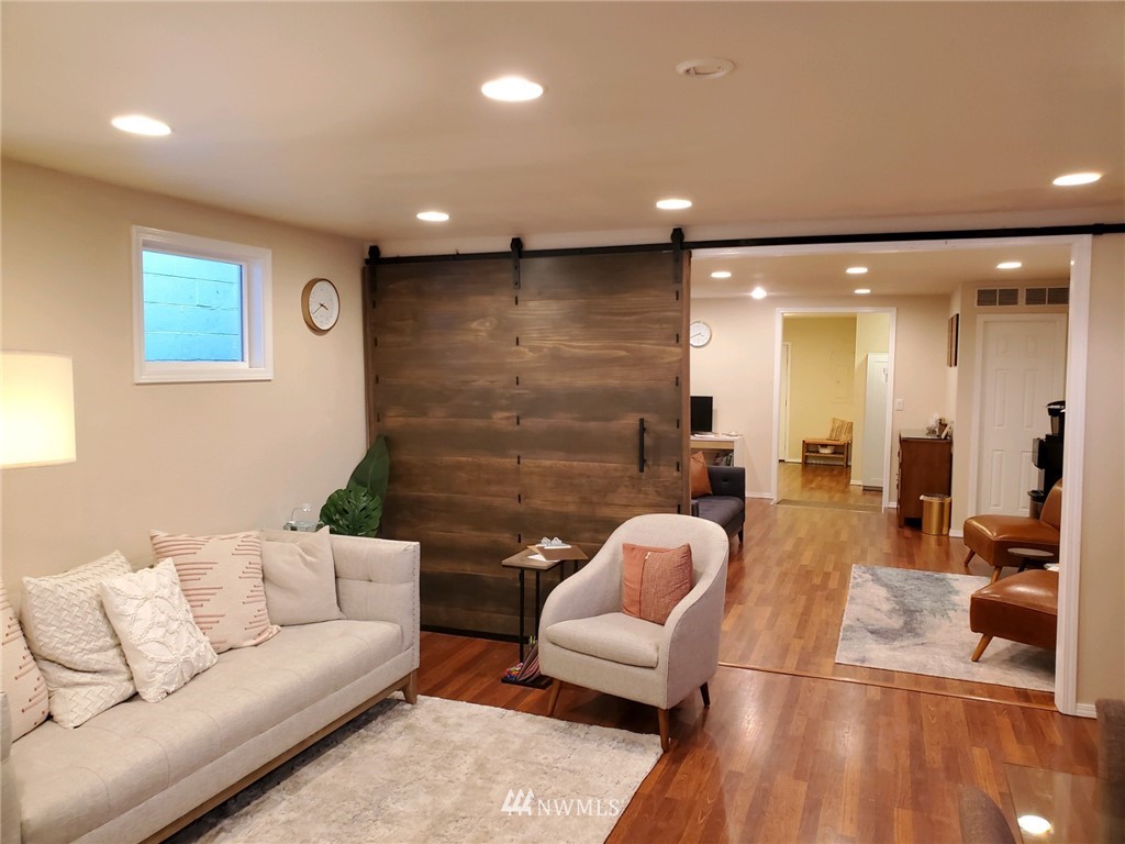 2212 Broadway Everett, WA 98201 - Photo 2 of 26 a living room with furniture and a couch