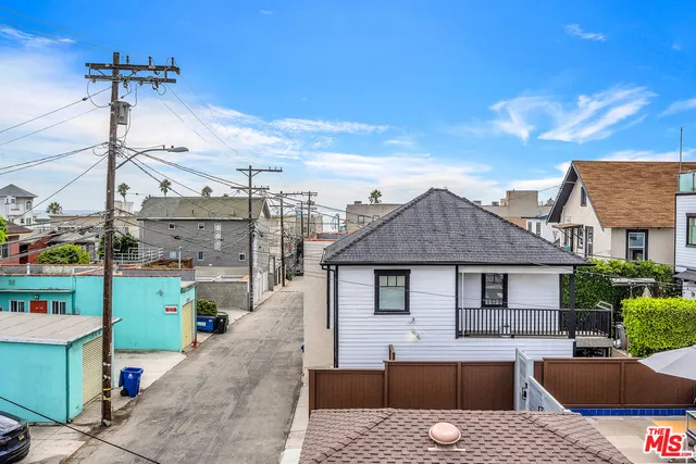 a aerial view of a house with a patio