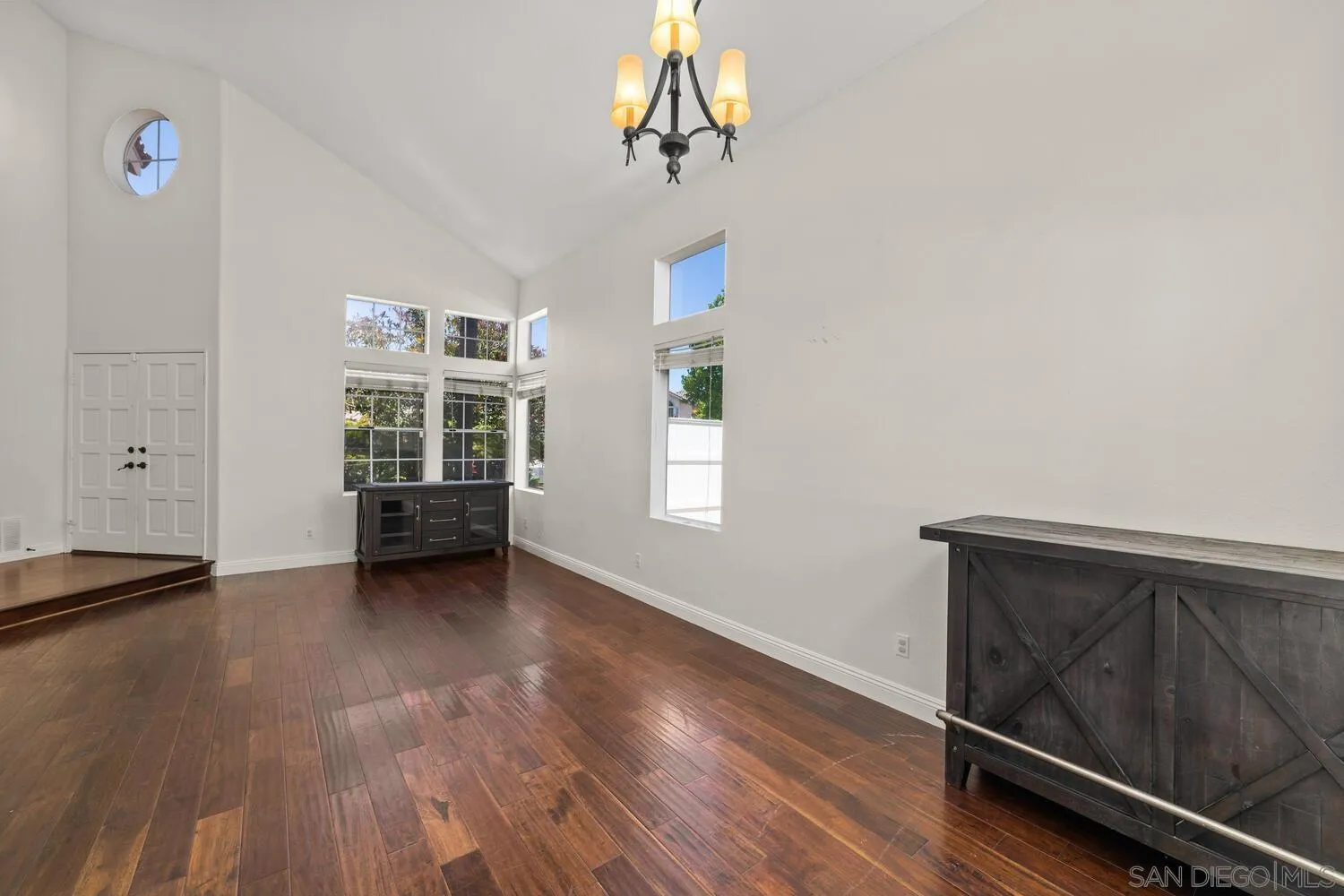 1690 Mountain Pass Circle Vista, CA 92081 - Photo 12 of 46 an empty room with windows