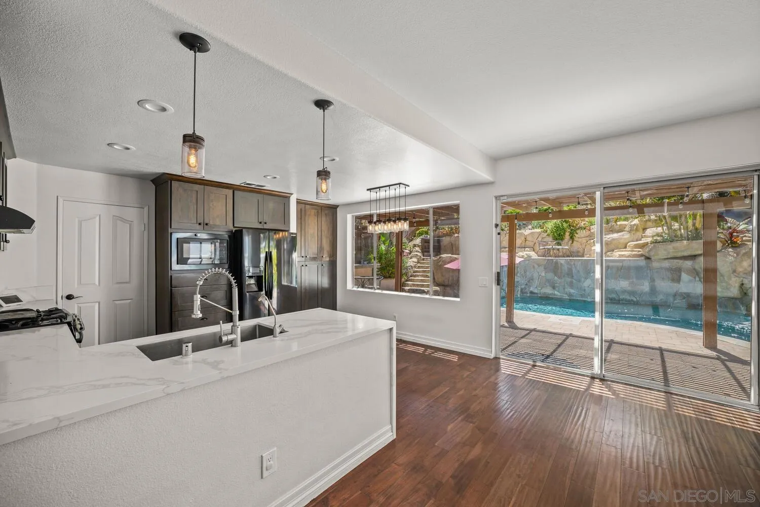 1690 Mountain Pass Circle Vista, CA 92081 - Photo 20 of 46 a room with a large window and gym equipment