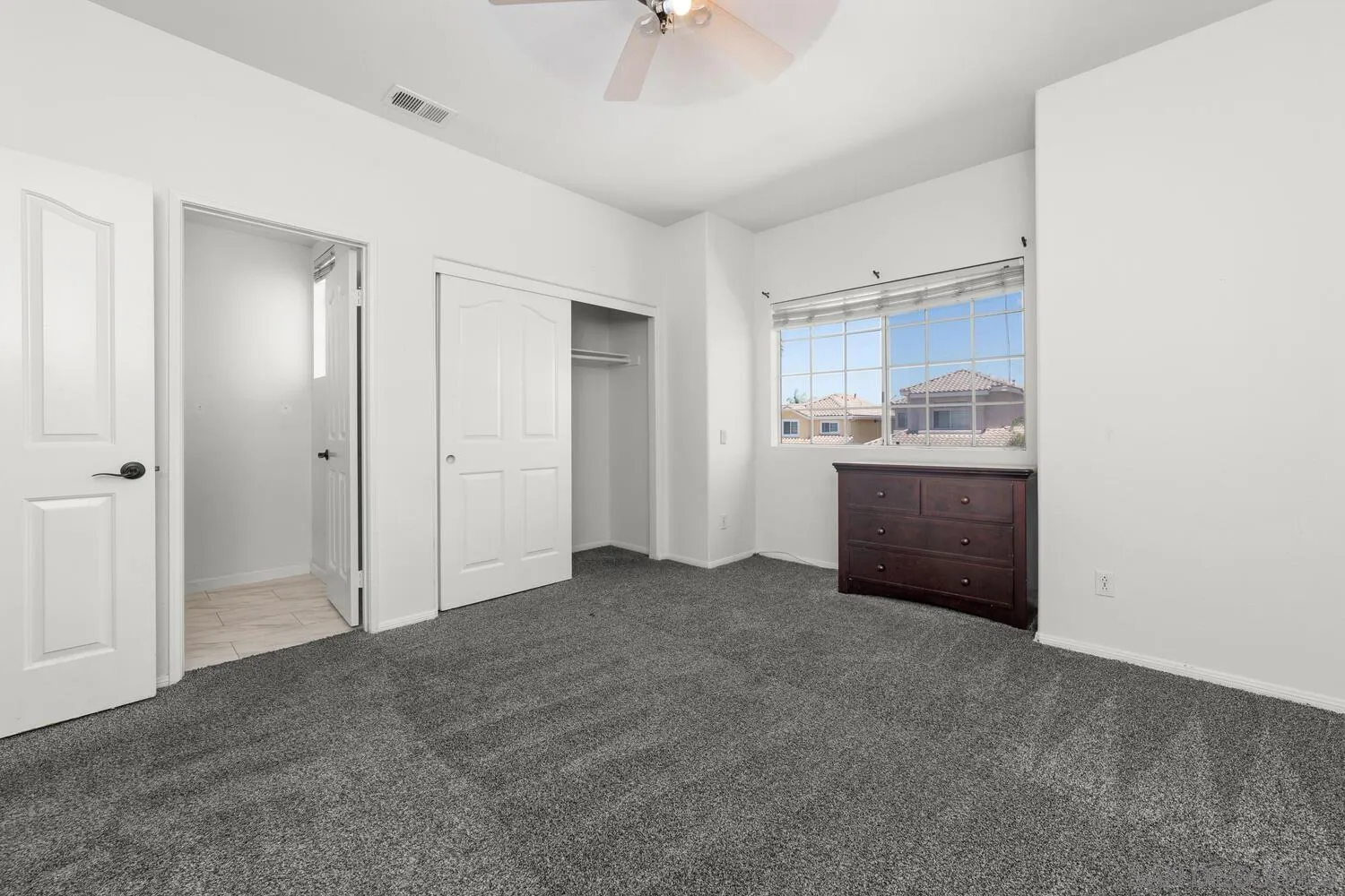 1690 Mountain Pass Circle Vista, CA 92081 - Photo 31 of 46 a view of a kitchen with a sink and cabinet area