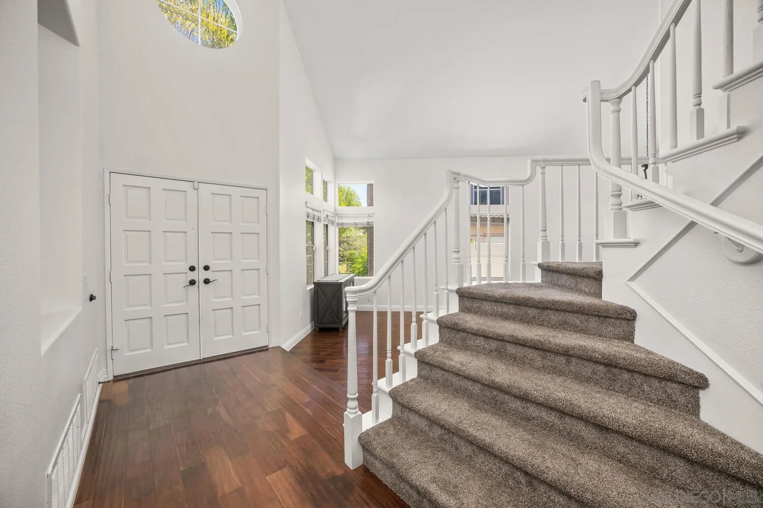 1690 Mountain Pass Circle Vista, CA 92081 - Photo 9 of 46 a view of entryway with wooden floor