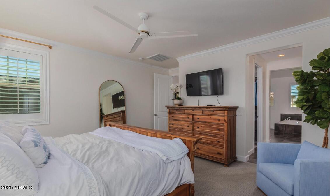 947 West Kaibab Drive Chandler, AZ 85248 - Photo 16 of 32 a bedroom with a bed and a flat screen tv