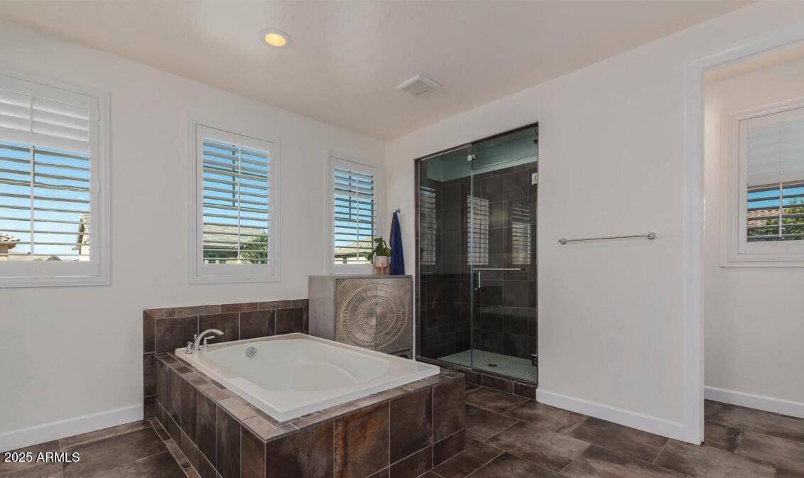 947 West Kaibab Drive Chandler, AZ 85248 - Photo 17 of 32 a bedroom with a bed and a window