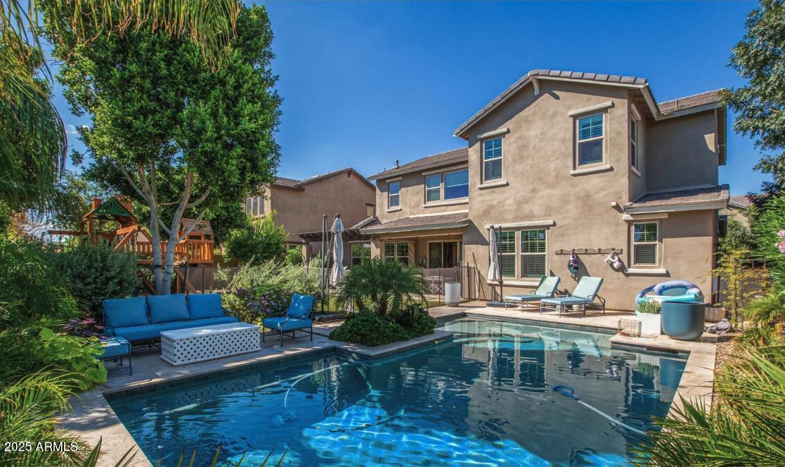 947 West Kaibab Drive Chandler, AZ 85248 - Photo 2 of 32 a view of a building with patio