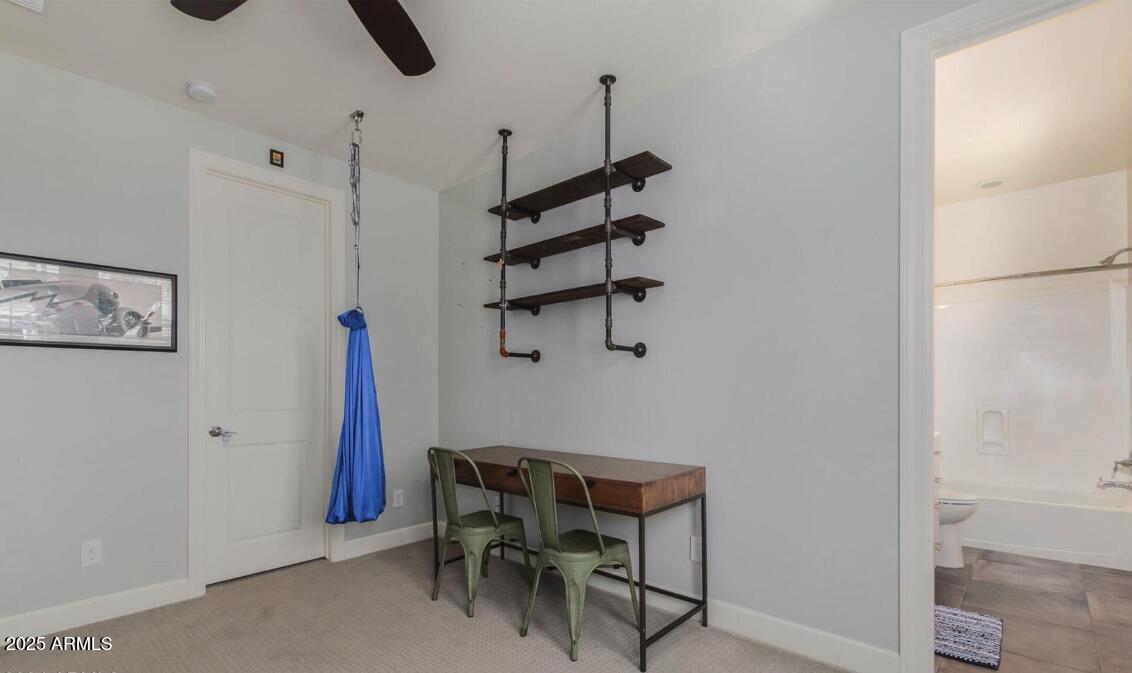 947 West Kaibab Drive Chandler, AZ 85248 - Photo 25 of 32 a view of a room with a table and chairs