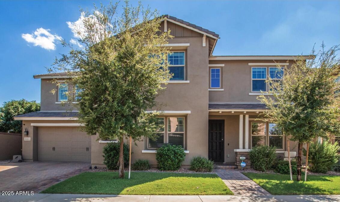 947 West Kaibab Drive Chandler, AZ 85248 - Photo 29 of 32 a front view of a house with garden