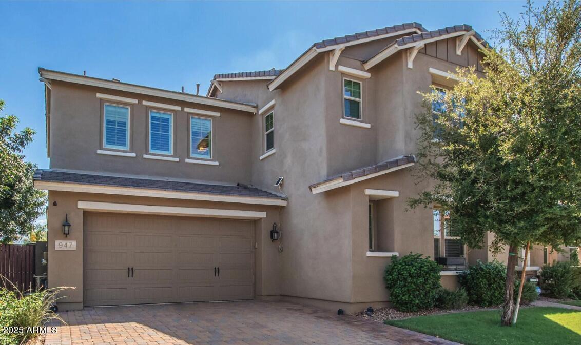 947 West Kaibab Drive Chandler, AZ 85248 - Photo 31 of 32 a view of the house with a garage and a yard