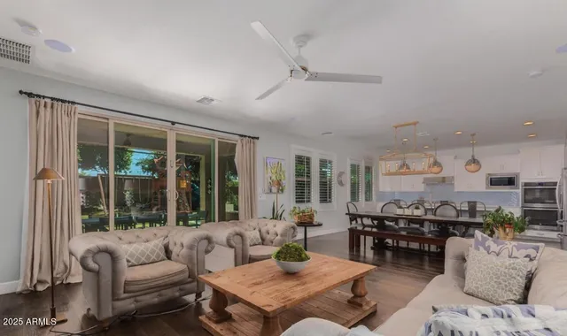a kitchen with a table and chairs in it