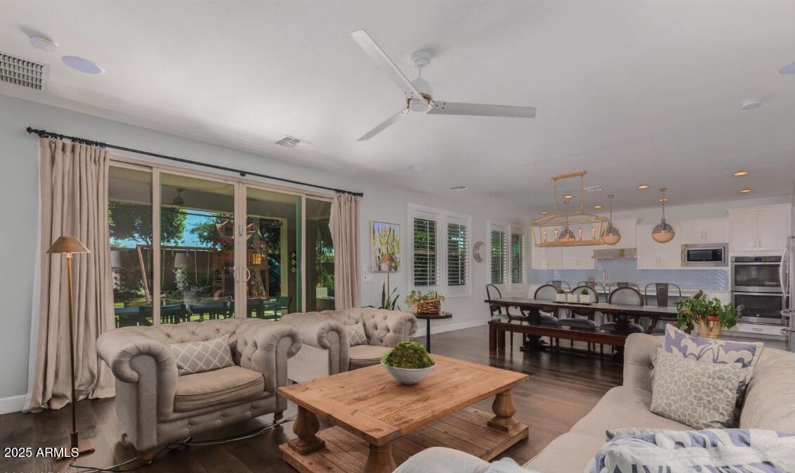 947 West Kaibab Drive Chandler, AZ 85248 - Photo 7 of 32 a living room with furniture and a large window