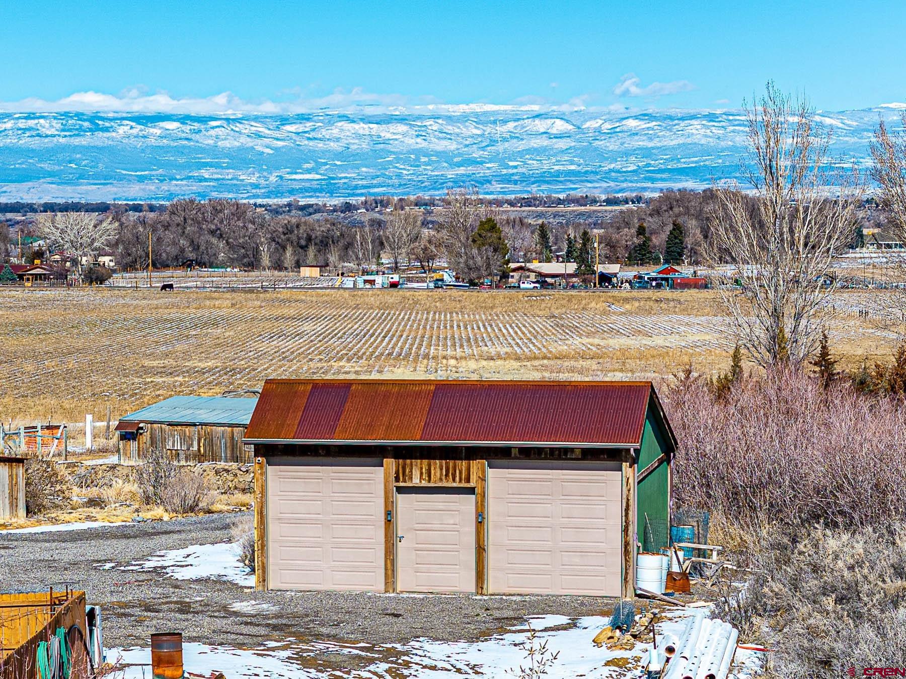 12689 6100th Road Montrose, CO 81403 - Photo 38 of 45 a view of an ocean with a nearby beach