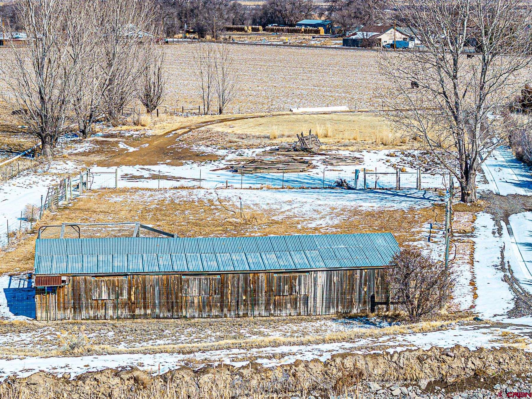 12689 6100th Road Montrose, CO 81403 - Photo 40 of 45 a view of a lake with a mountain view