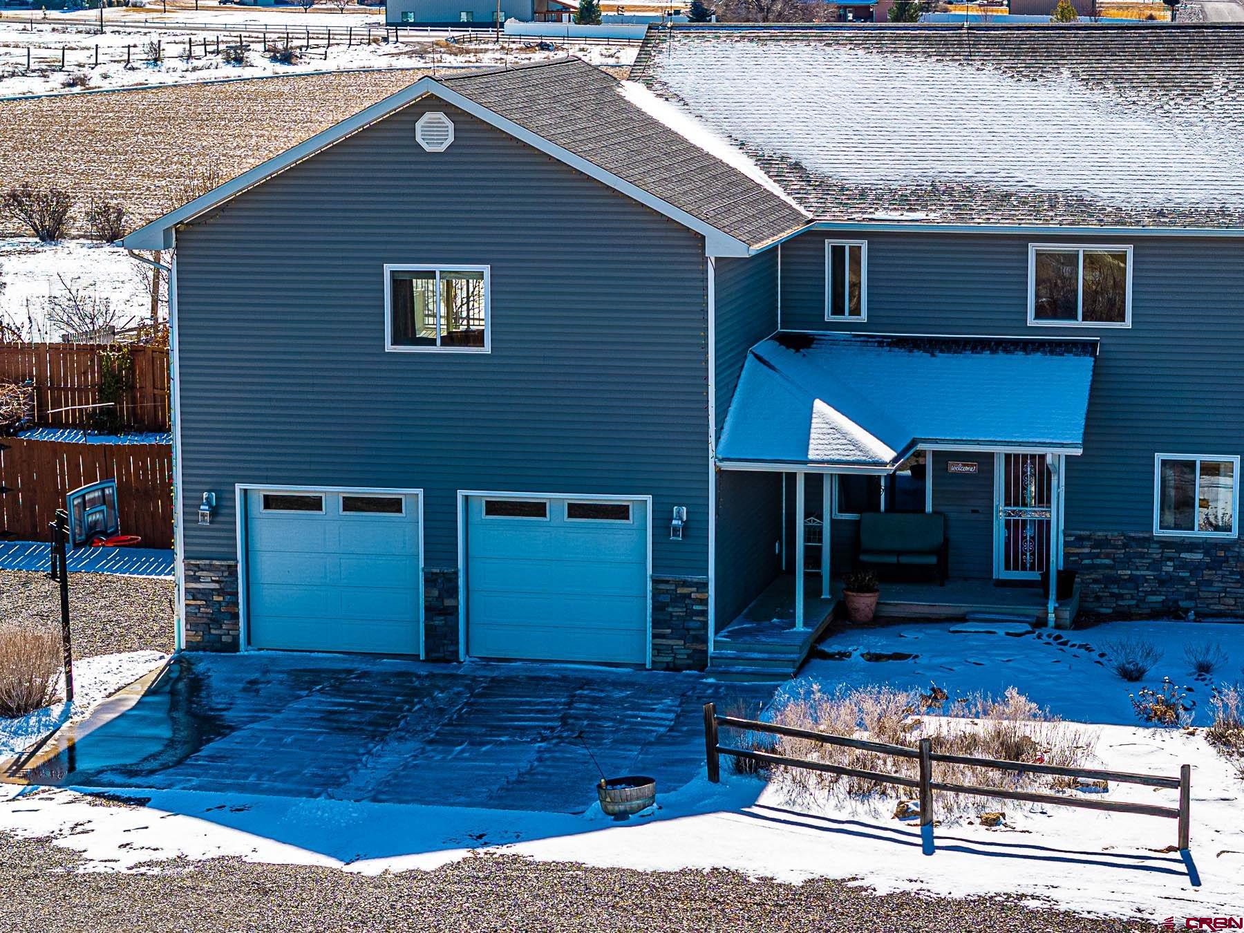 12689 6100th Road Montrose, CO 81403 - Photo 5 of 45 a house view with a backyard space