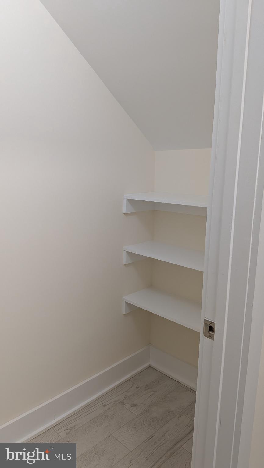 329 16th Street Southeast, Unit 1 Washington, DC 20003 - Photo 18 of 22 a view of an empty walk in closet